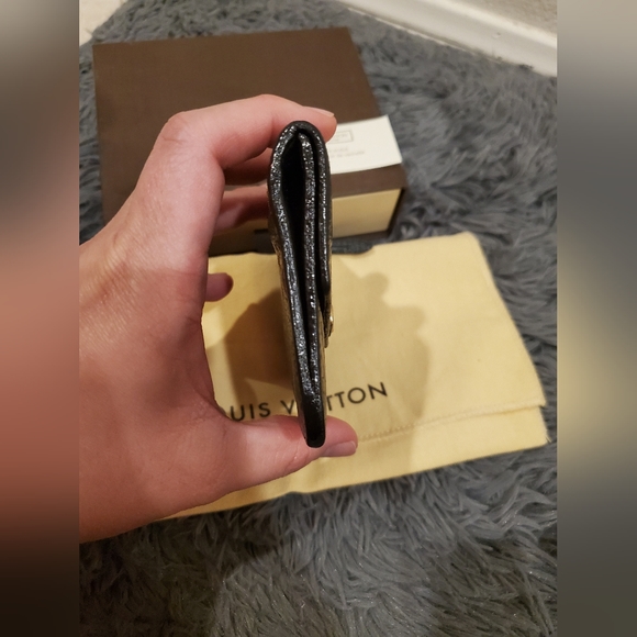 Louis Vuitton Monogram Empreinte key pouch in black - Picture 12 of 16